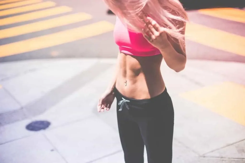 Woman with toned stomach after LA-EMS Body Sculpting Treatment Birchfield